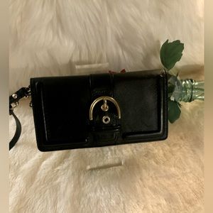 COACH - Black wristlet.